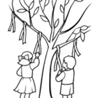 Children hanging wishes on a tree
